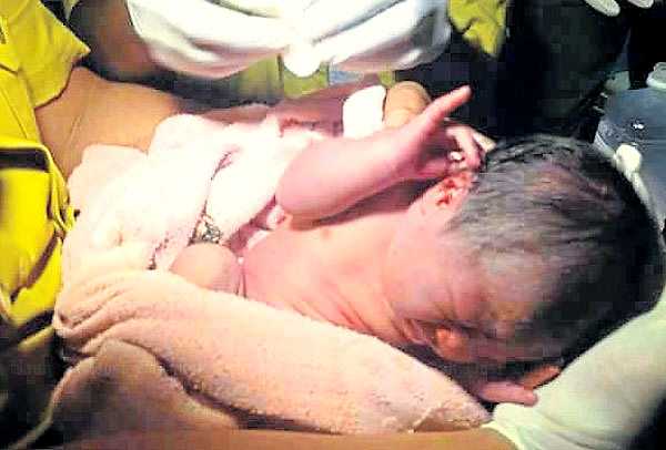 woman charged for attempted murder for throwing her newborn baby in bin.